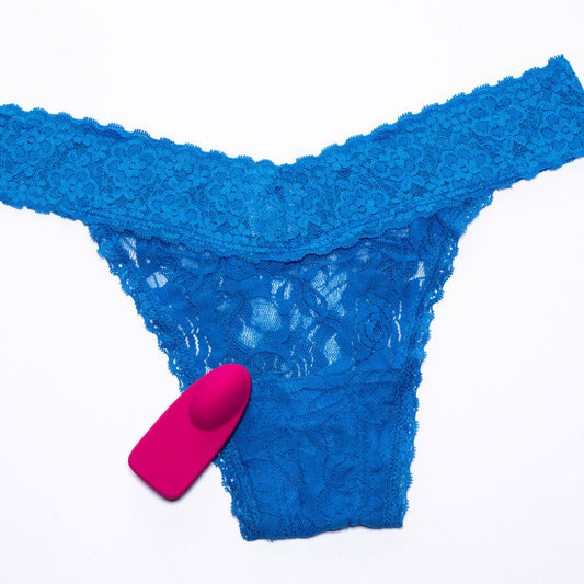OhMiBod NEX1 BlueMotion Vibe next to a lace panty. Panty not included!